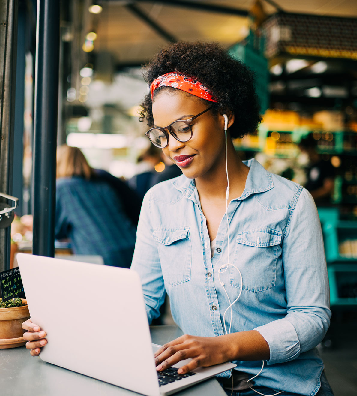 Woman in coffee shop on computer blog-4